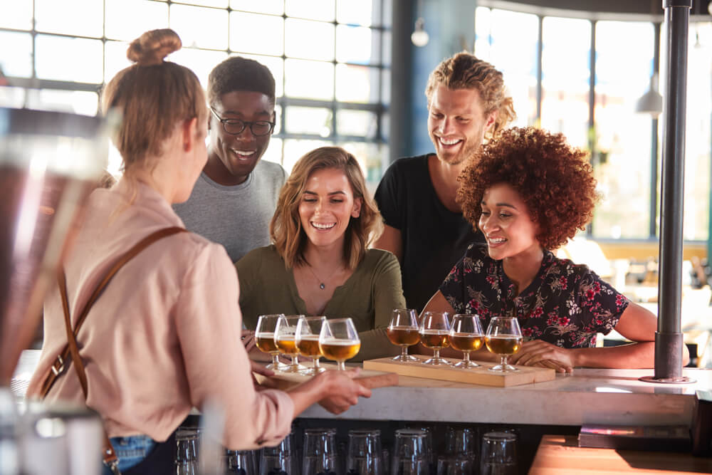 A group of people at a Boothbay Harbor brewery.