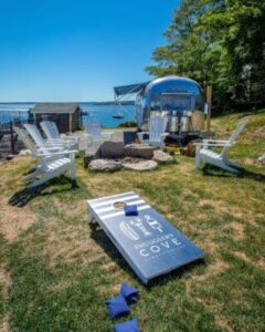 A firepit and game area at a resort near downtown Boothbay Harbor.