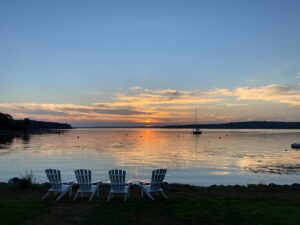 The beachfront area of a Boothbay Harbor area resort to stay at on a Maine wellness retreat.