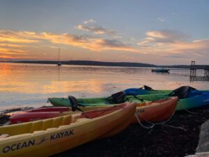 Kayaks at a Boothbay Harbor area resort to use after checking out local events.